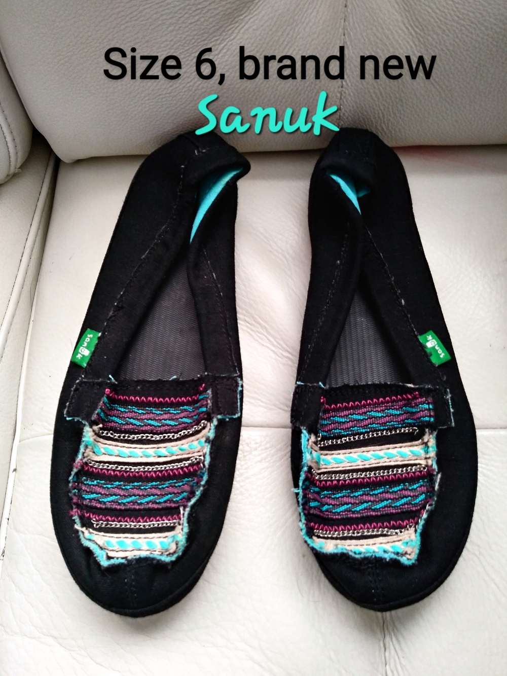 Sanuk Women's Black Slip-On Flats with Teal and Multicolor Embroidery